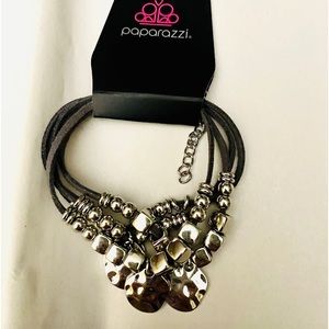 Paparazzi black leather and silver tone bracelet. Brand new...clasp closure.